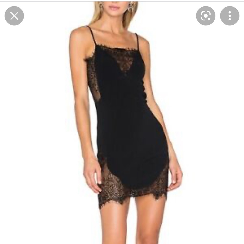 Black X by NBD dress. New with tags. Perfect condition. Never worn